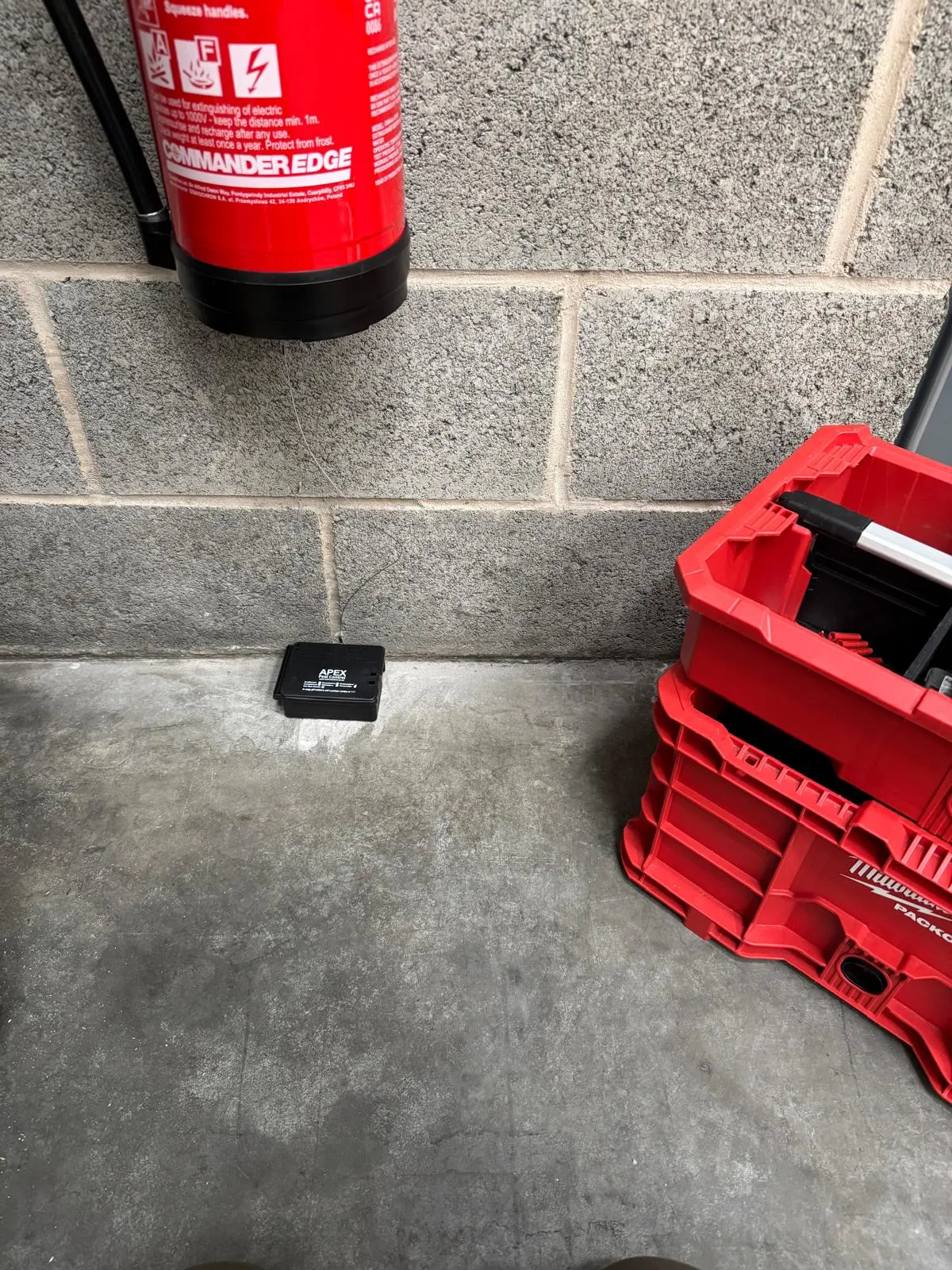 Rodent bait box placed inside a commercial building as part of an internal monitoring network